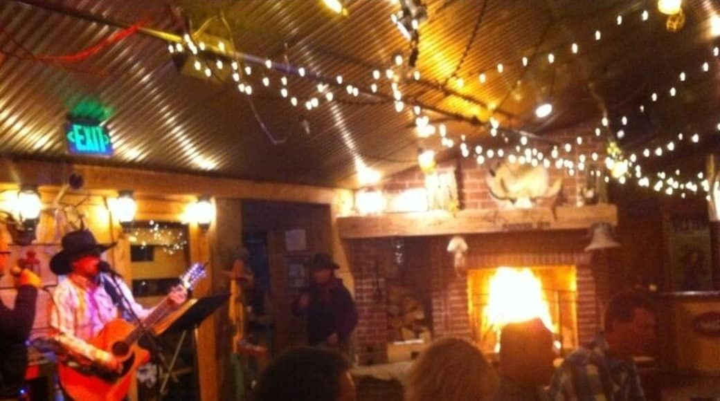 Snowed Inn, horse drawn sleigh ride to get there. Live music. Order the fresh trout.