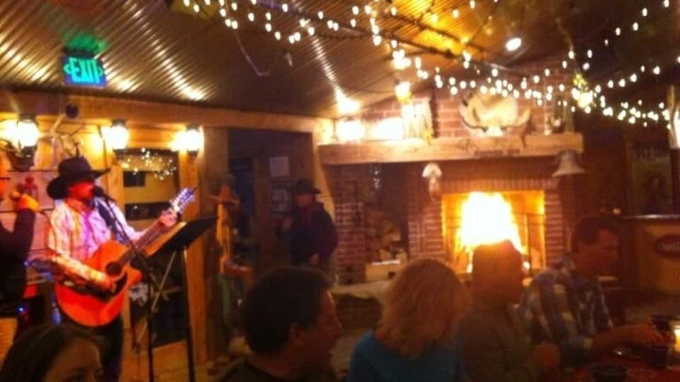 Snowed Inn, horse drawn sleigh ride to get there. Live music. Order the fresh trout.