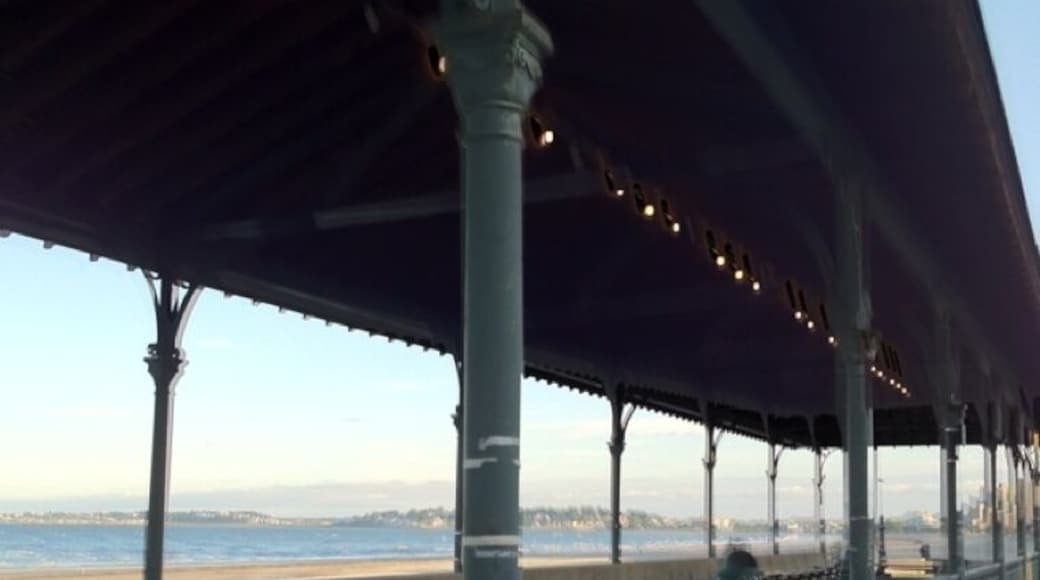 Across from Kelly's-place for everyone to eat, and go jump in the ocean!