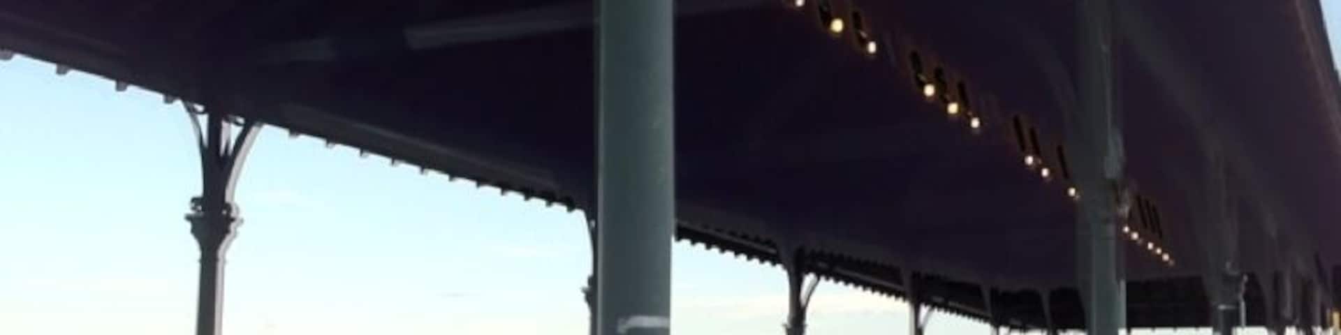 Across from Kelly's-place for everyone to eat, and go jump in the ocean!