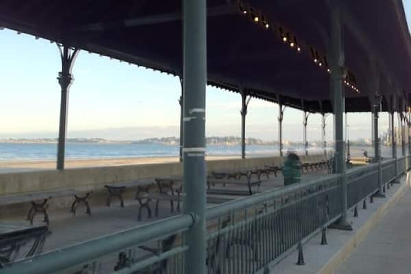 Across from Kelly's-place for everyone to eat, and go jump in the ocean!