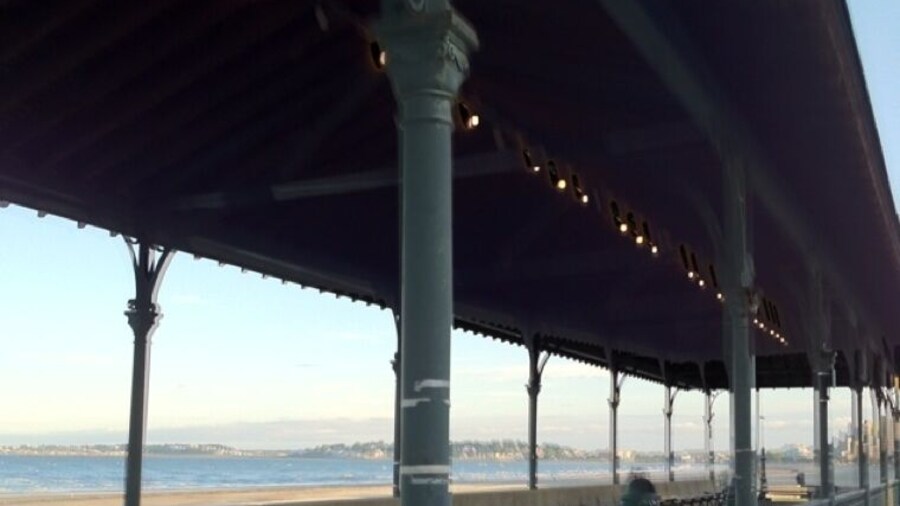 Across from Kelly's-place for everyone to eat, and go jump in the ocean!