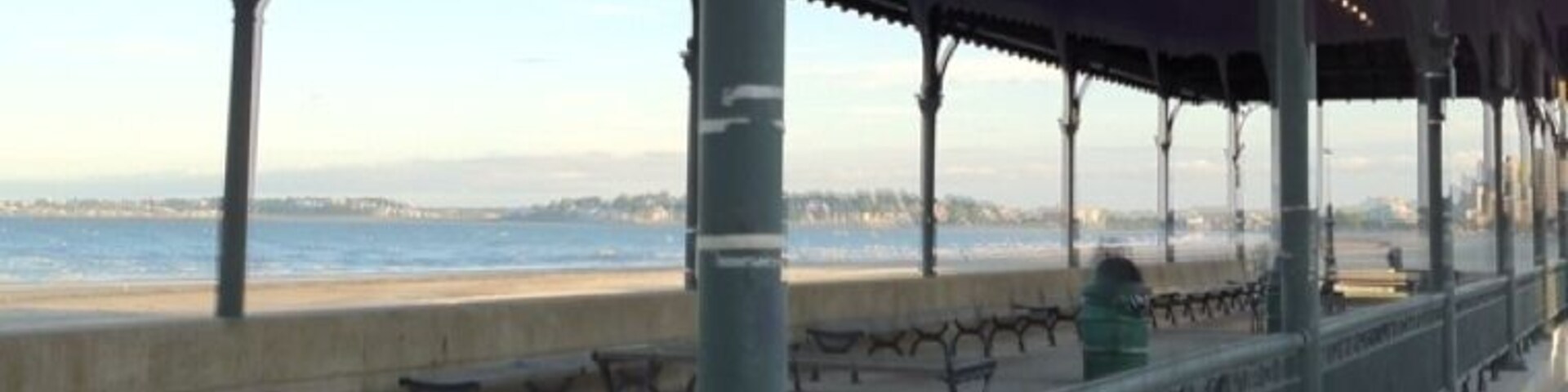 Across from Kelly's-place for everyone to eat, and go jump in the ocean!