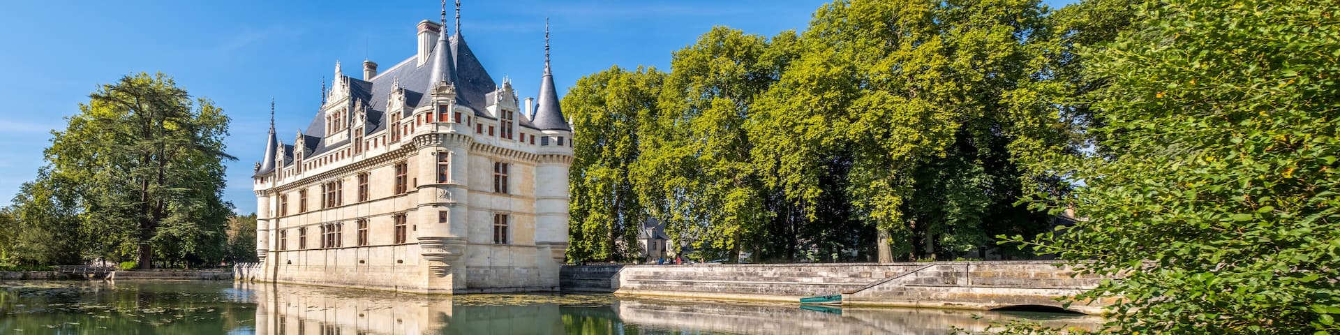 Panoramic view on chateau Azay-le-Rideau reflecting in a pound at sunny day, Loire valley, France.