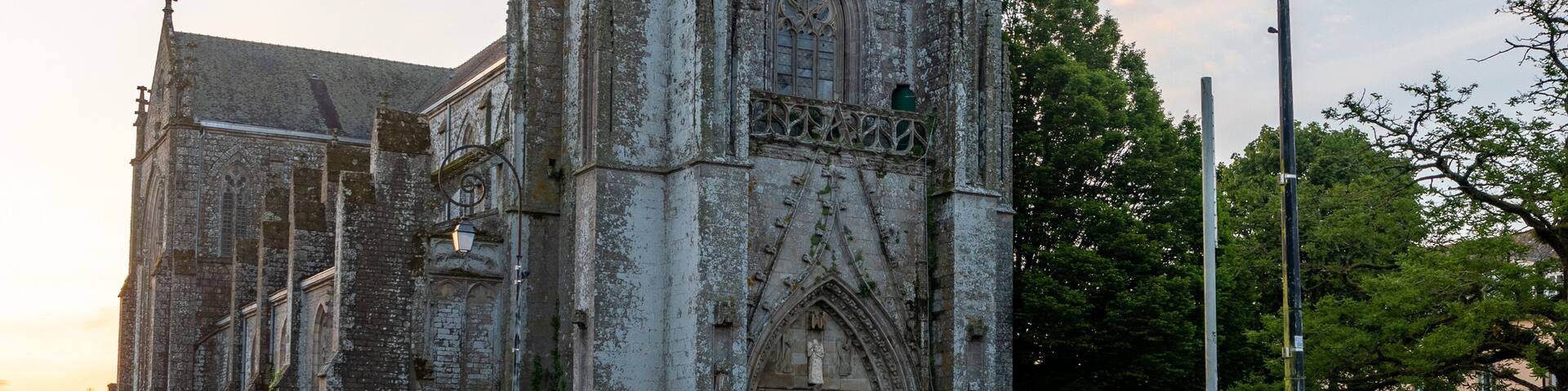 Ancienne Collégiale Saint-Trémeur
An ancient Gothic cathedral at sunrise in Carhaix-Plouguer, Brittany, France