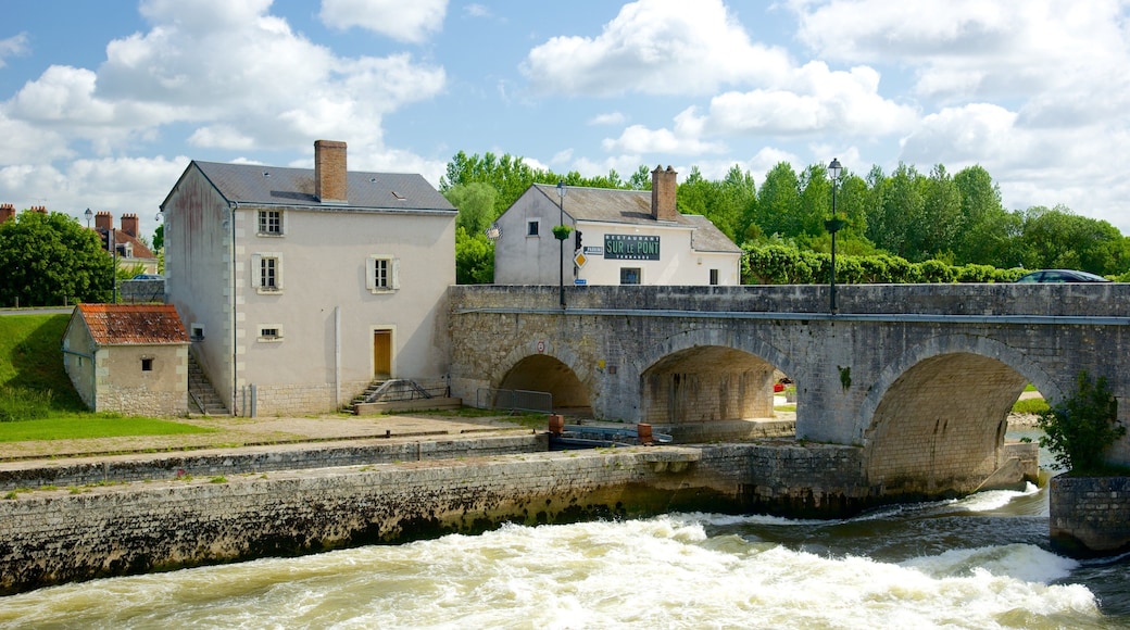 Saint-Aignan which includes a bridge and a river or creek