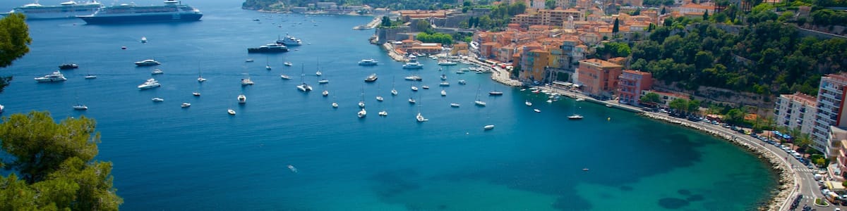 French Riviera which includes a bay or harbour, a beach and boating