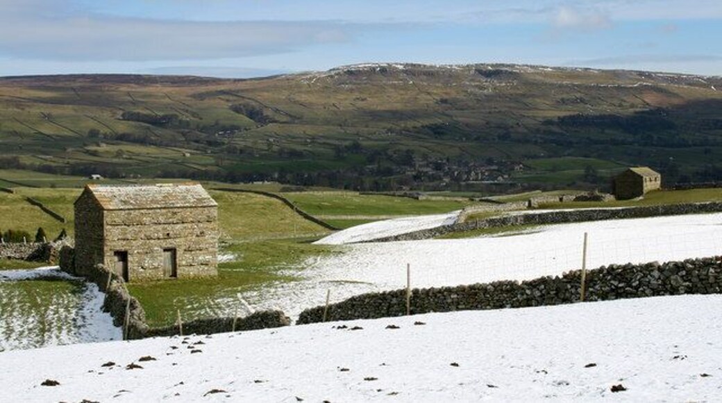 Barns above Bainbridge Snow still lying on the north facing slopes with Askrigg in the middle distance and East Bolton Moor beyond.