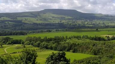 A view across the broad Dale of Wensley to Penn Hill.I took the photo from the Leyburn Shawl,so called because Mary Queen of Scots was imprisoned at nearby Bolton Castle but escaped and was caught near Leyburn were her Shawl was found shortly after