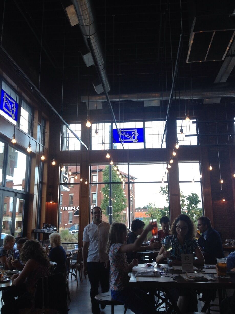 very cool space in old buick dealership. great flatbread pizza, great vibe.