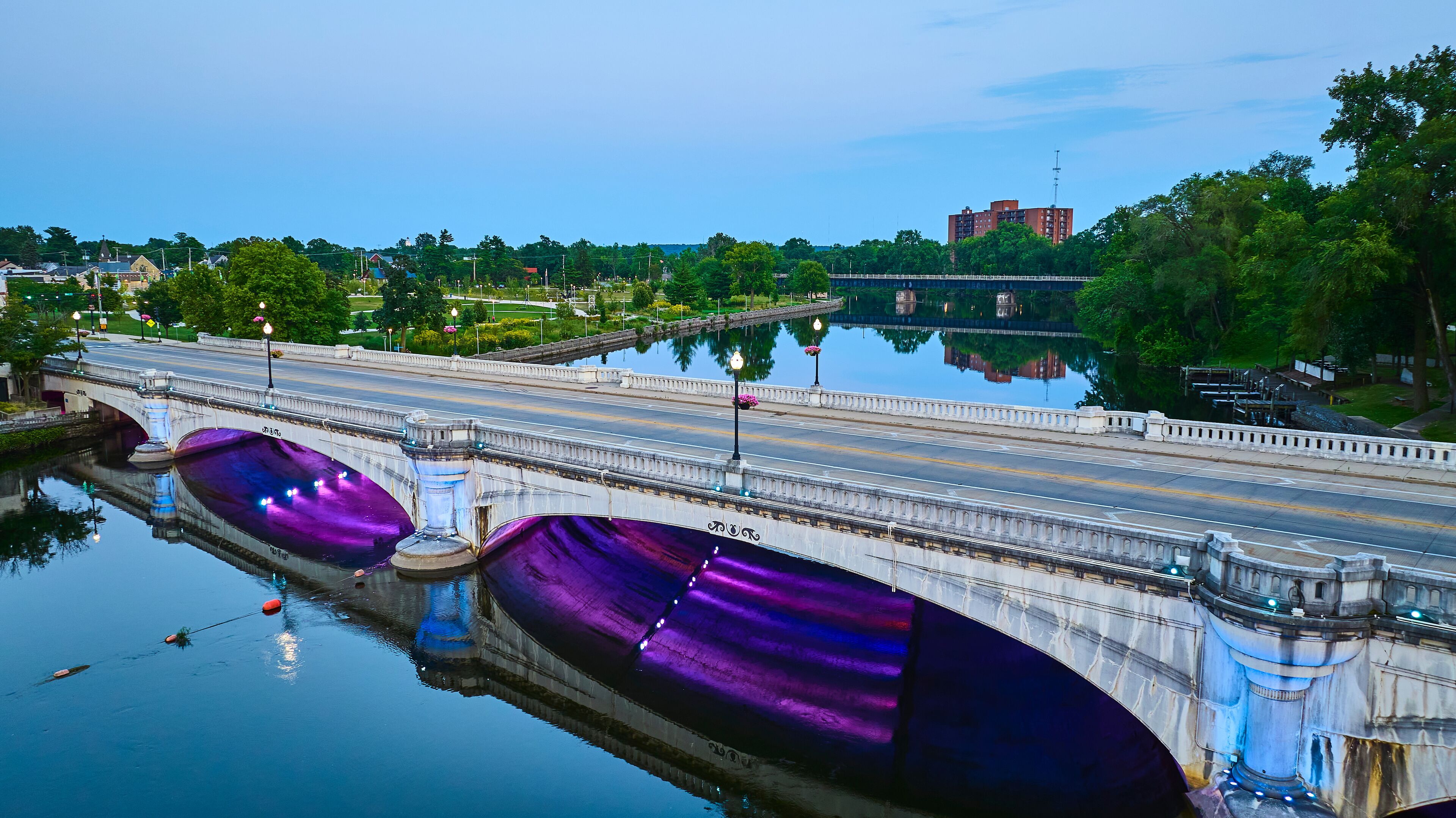 Aerial View of Serene Urban Bridge with Purple and Blue Lights in South Bend