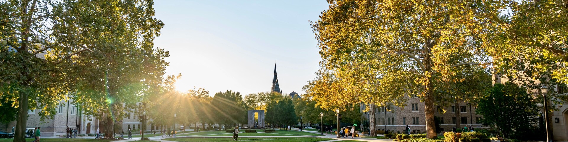 The sun setting on the campus of the University of Notre Dame on a bright sunny day