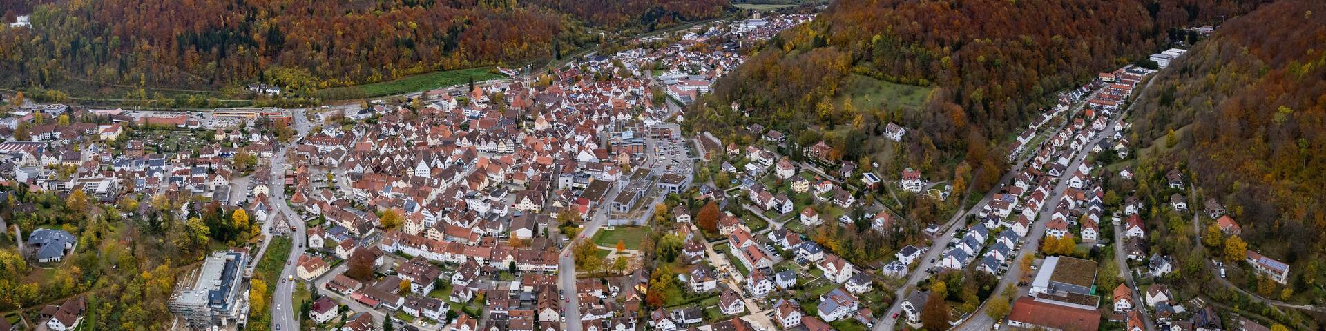 Aerial view of the old town of the city Bad Urach in Germany on a sunny afternoon in autumn