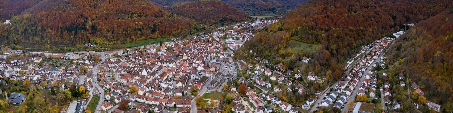 Aerial view of the old town of the city Bad Urach in Germany on a sunny afternoon in autumn