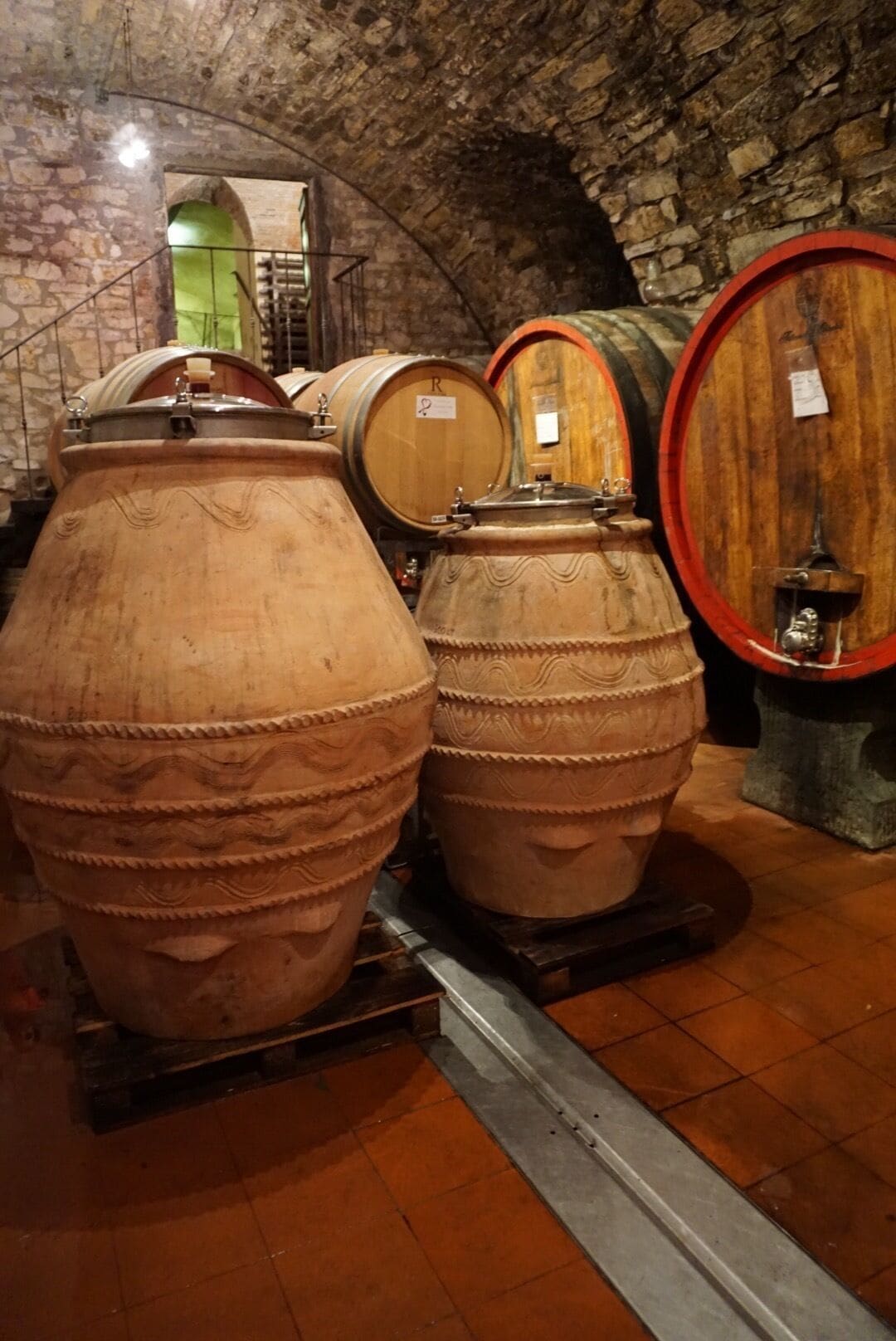 Visited this winery yesterday and bought a bottle of their 2009 Riserva. It's worth a visit especially if you love Chianti. They also make terra cotta pots and barrels as shown in this photo where they age some of their wines. 