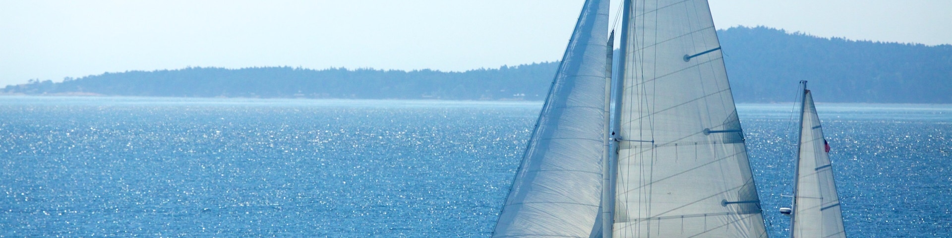 San Juan Islands qui includes navigation et vues littorales aussi bien que petit groupe de personnes