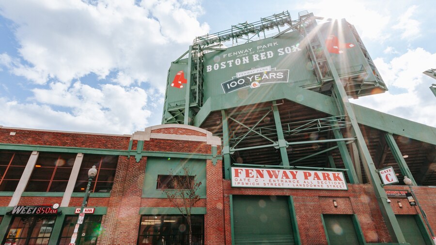 Fenway Park showing a sunset and signage