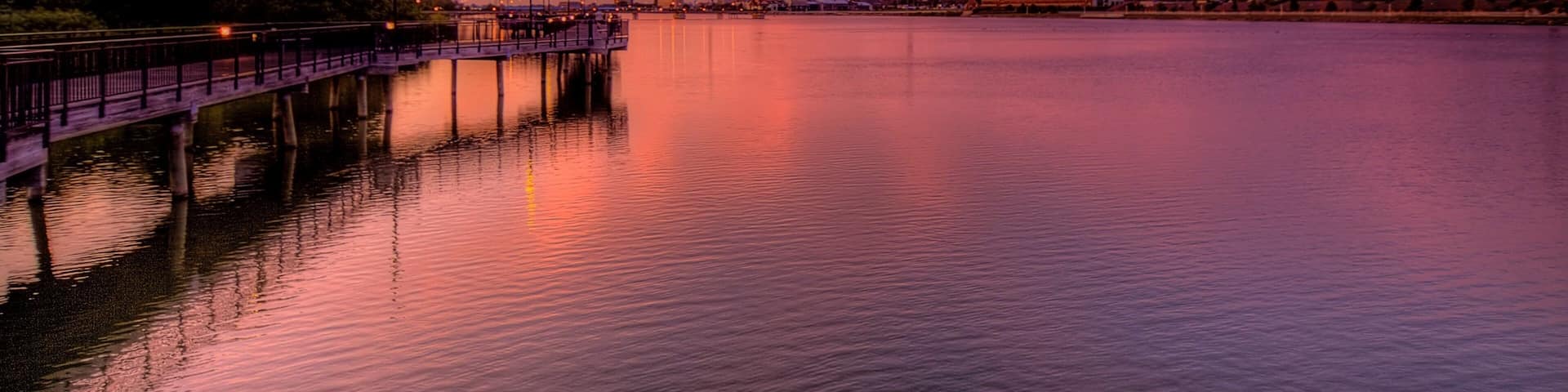 Saginaw which includes a river or creek and a sunset