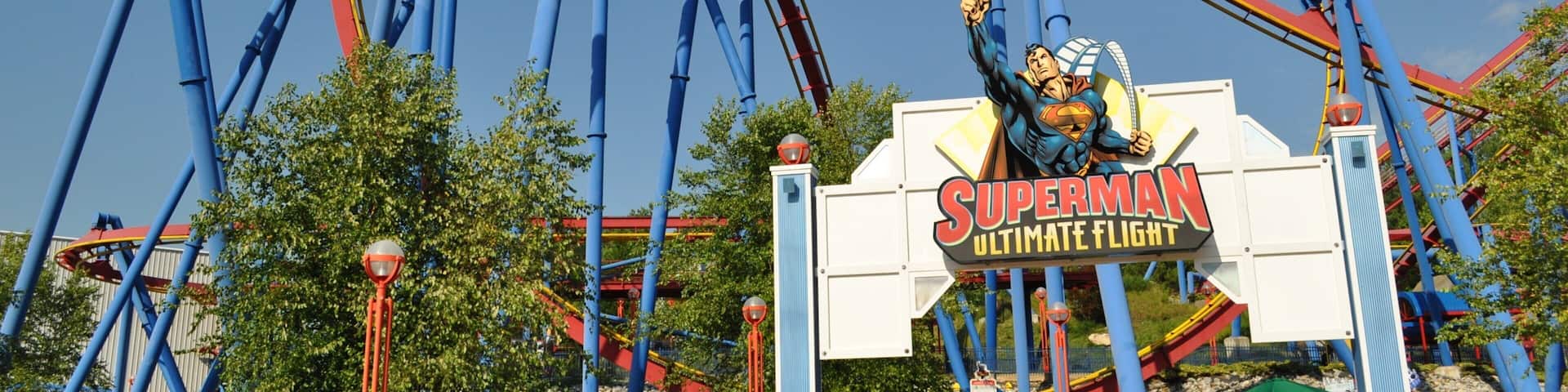 Six Flags Over Georgia which includes signage and rides