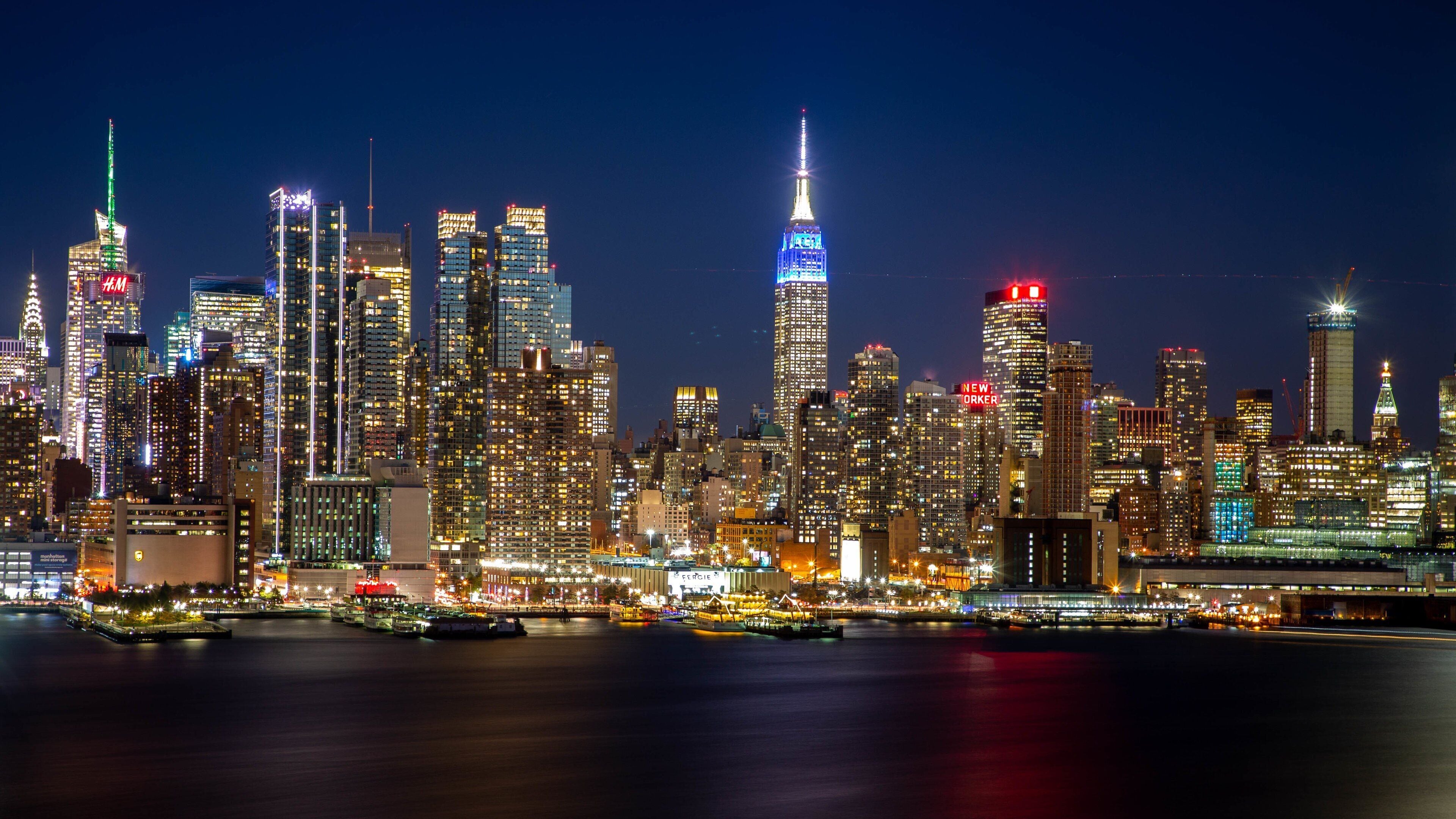 Jersey City which includes night scenes, a bay or harbor and a city