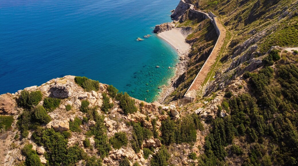 Aerial drone. Capo Calava bay and beach, with several holiday parks, resort and villages, near Gioiosa Marea, Sicily, Italy.