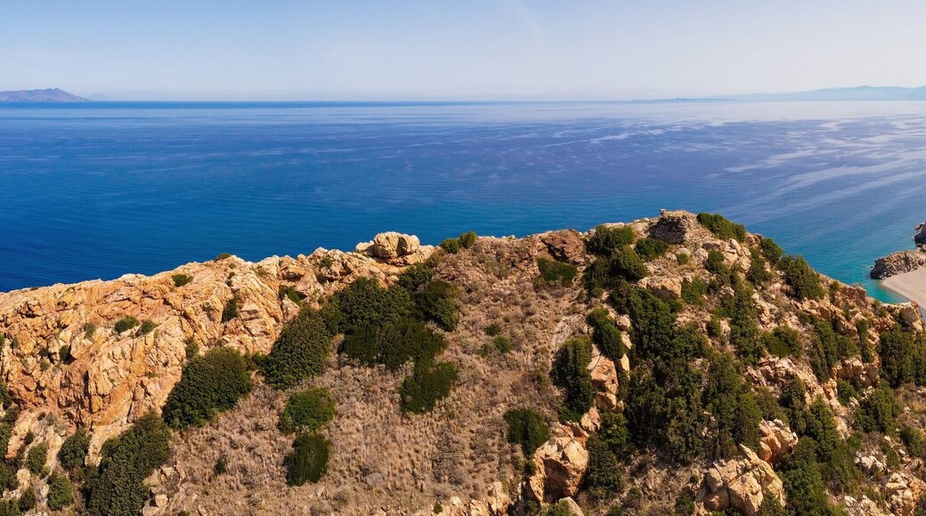 Aerial drone. Capo Calava bay and beach, with several holiday parks, resort and villages, near Gioiosa Marea, Sicily, Italy.