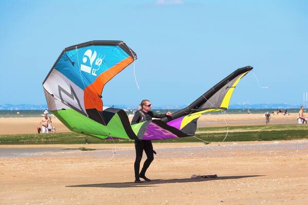 Getting ready to kite surf. There's a great beach here, it's well worth a visit.