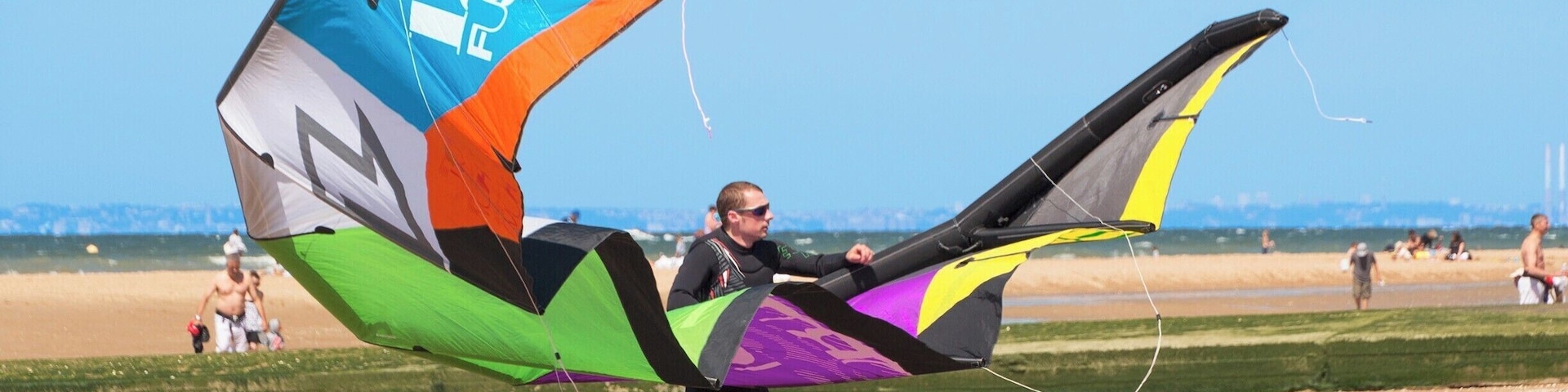 Getting ready to kite surf. There's a great beach here, it's well worth a visit.