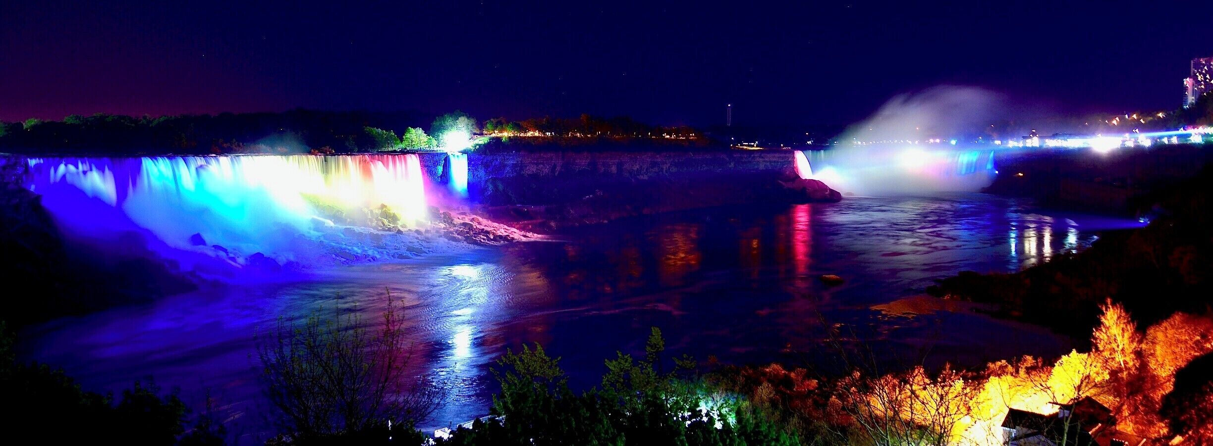 Niagara Falls is the collective name for three waterfalls that straddle the international border between Canada and the United States.

Niagara Falls isn't officially one of the Wonders of the World, but it might as well be. You shall visit this splendour of the natural landscape once in your lifetime!
#Canada #Ontario #NiagaraFalls #waterfall #naturalwonder #illumination #AmericanFalls