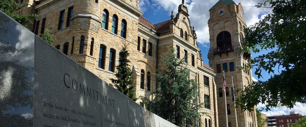 The beautiful Lackawanna County Courthouse in downtown Scranton Pennsylvania with a portion of the Veterans Memorial wall.