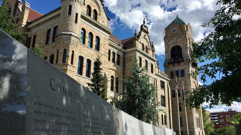 The beautiful Lackawanna County Courthouse in downtown Scranton Pennsylvania with a portion of the Veterans Memorial wall.