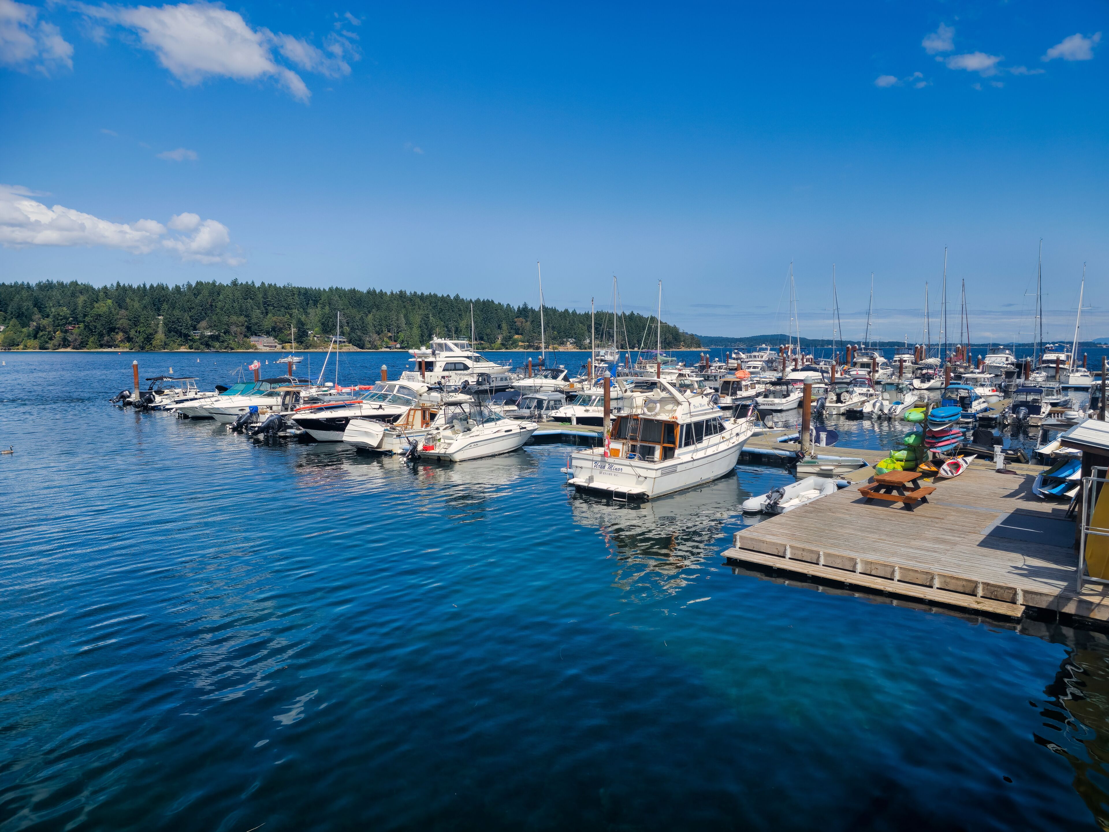 Boat launched at Mill Bay Marina during summer day