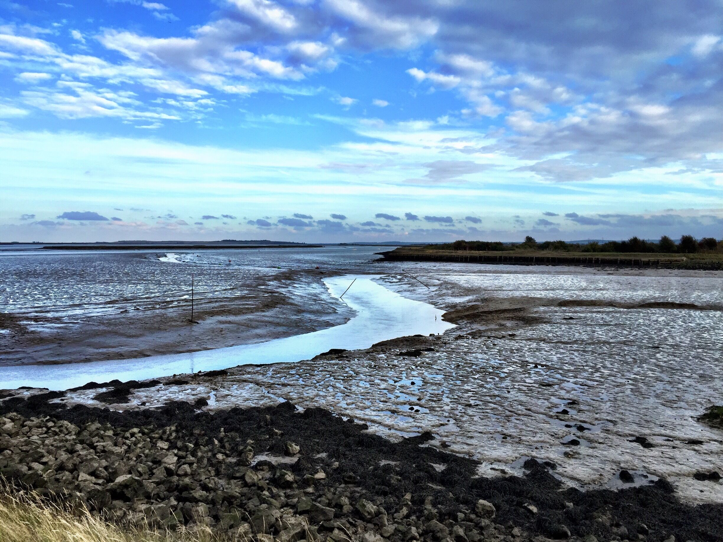 View North East from the Coastal Path leading from Conyer Quay out across the Thames Estuary. A peaceful place. Stop at the Ship Inn in Conyer after your walk.