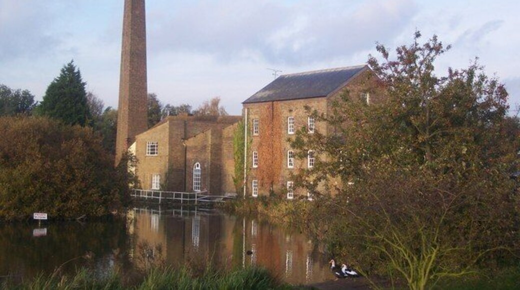 Tonge Mill and reflection in Tonge Mill Pond Seen from Tonge Mill Countryside Park opposite the mill. The ducks in the foreground are Muscovy Ducks. Recent visitors to the pond.