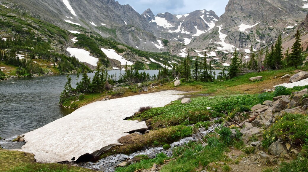 spectacular navajo, arapahoe, and shoshone peaks, and niwot ridge, as seen in summer across isabelle lake in the indian peaks wilderness area, near nederland, colorado