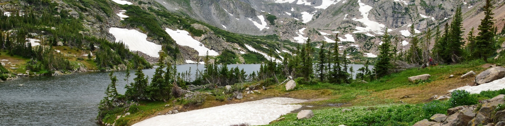 spectacular navajo, arapahoe, and shoshone peaks, and niwot ridge, as seen in summer across isabelle lake in the indian peaks wilderness area, near nederland, colorado