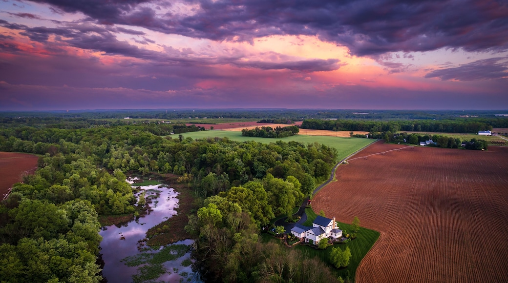 Aerial view of rainbow sunset in the countryside of Cranbury in New Jersey, USA