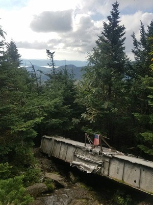 The remains of a b-29 bomber on the alpine trail headed to camels hump