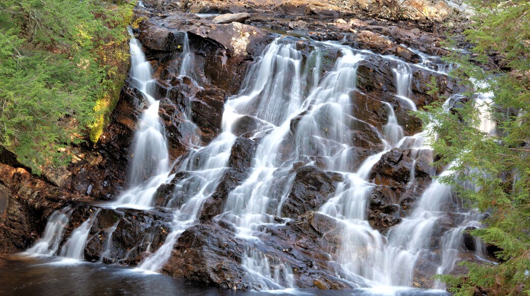 Beautiful Campton Falls in scenic tree-lined gorge along Beebe River in New Hampshire.