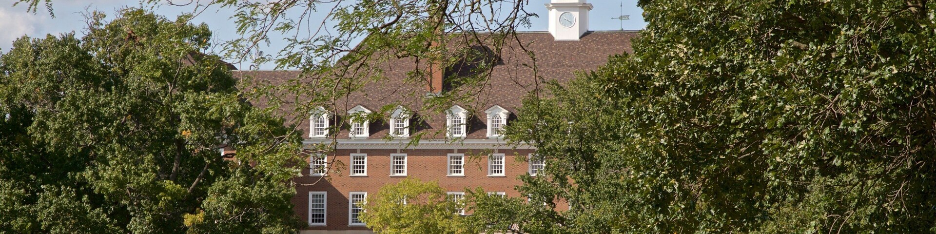 Champaign which includes a garden as well as a small group of people