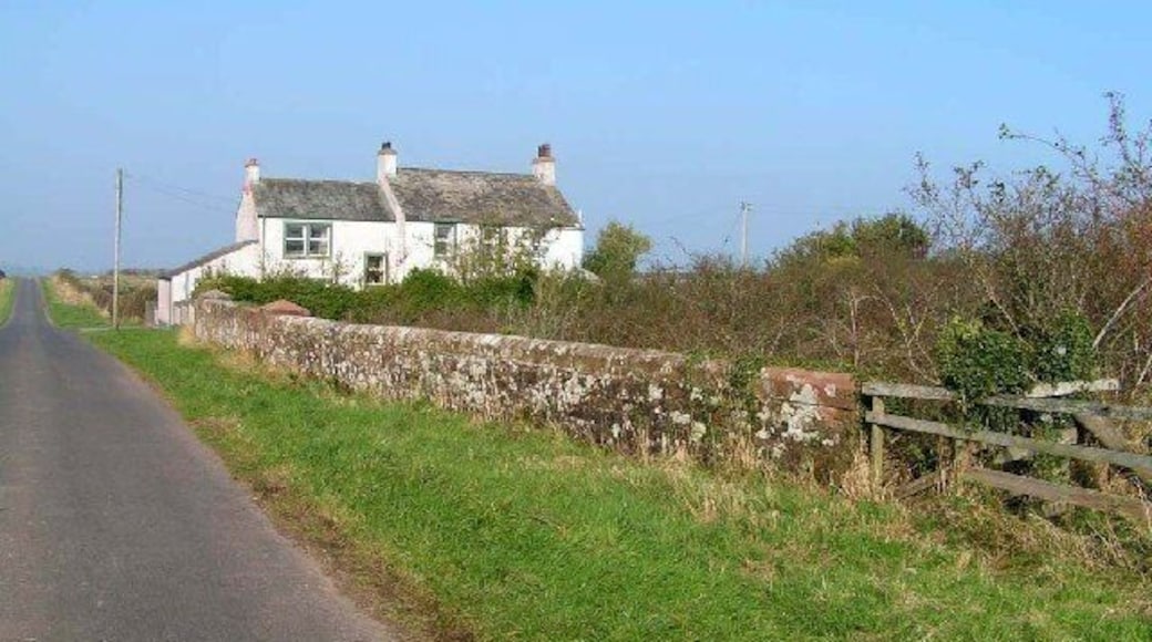 Minor road and railway bridge. This minor road runs parallel to the one shown in NY2045 and also crosses the Cumbrian Coast line at this point.