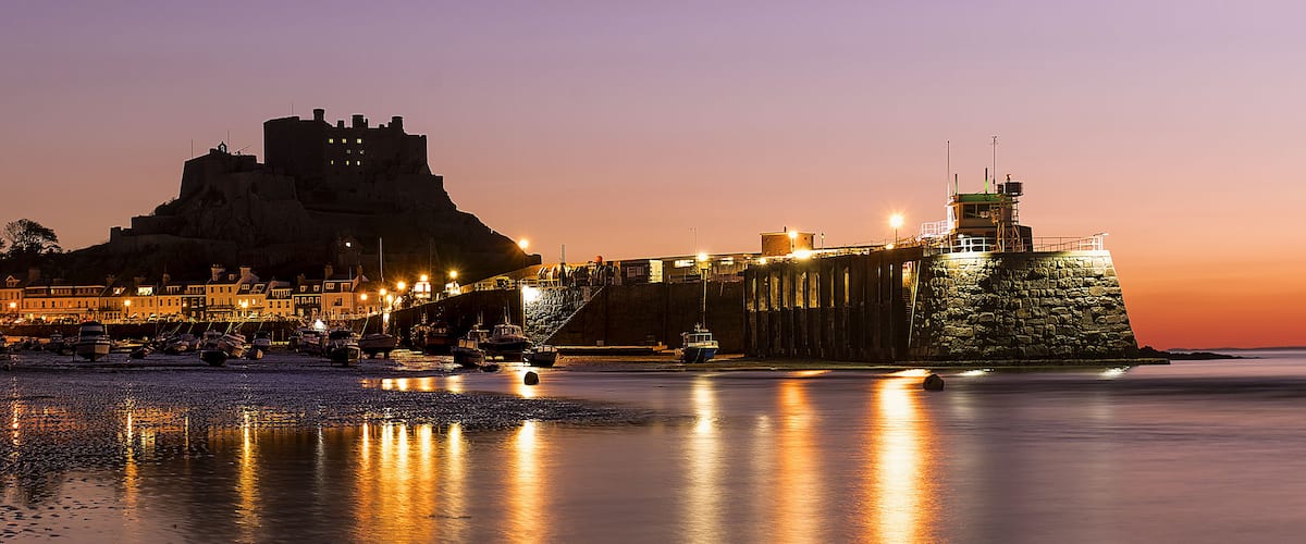 Mont Orgueil is a castle in Jersey that overlooks the harbour of Gorey. It is also called Gorey Castle by English-speakers, and lé Vièr Châté by Jèrriais-speakers