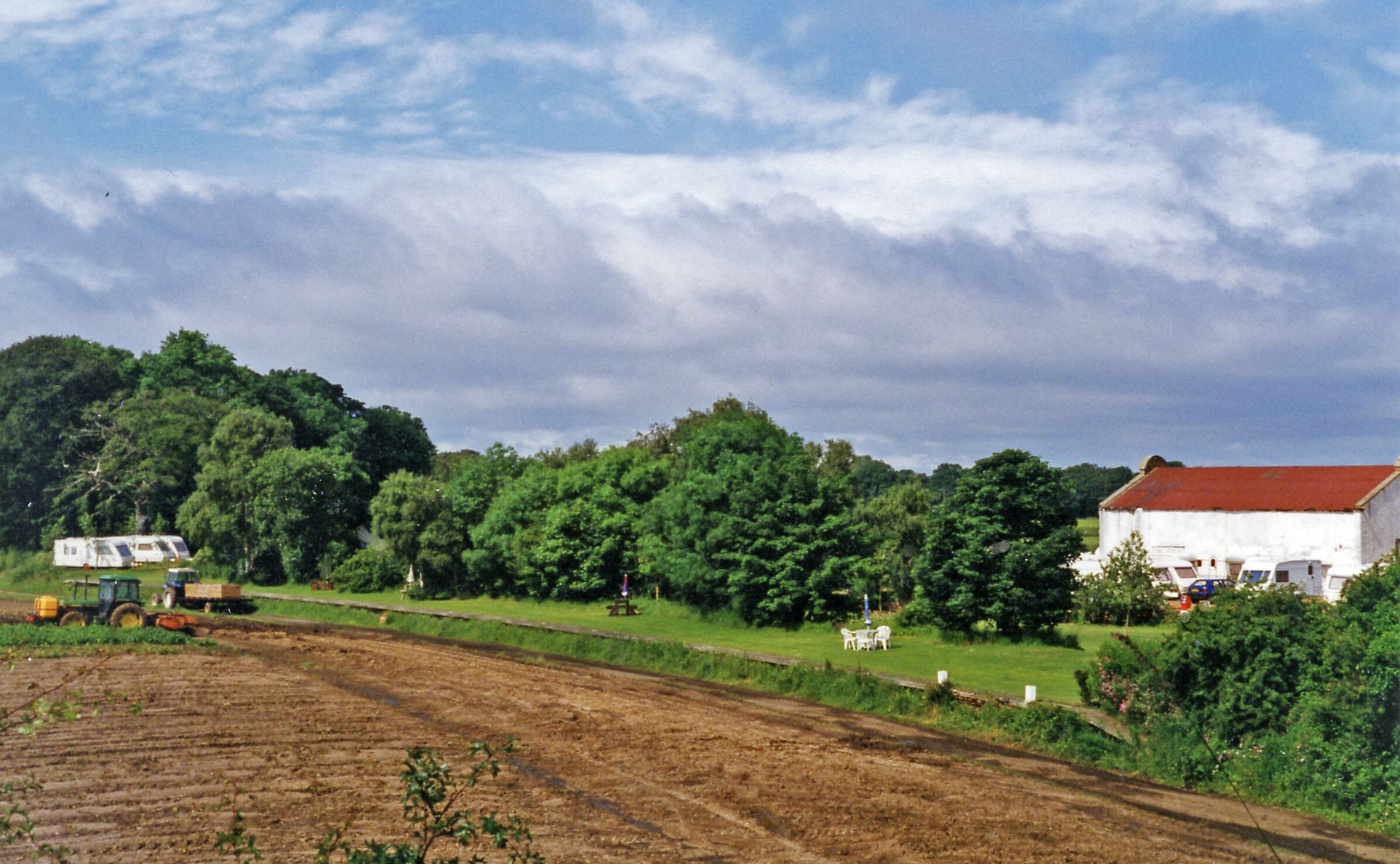 Aberlady station site/remains. View westward, towards Longniddry and Edinburgh: ex-NBR Longniddry (Aberlady Junction) - Gullane branch, which closed to passengers from 12/9/32 but remained open for goods until 15/6/64.