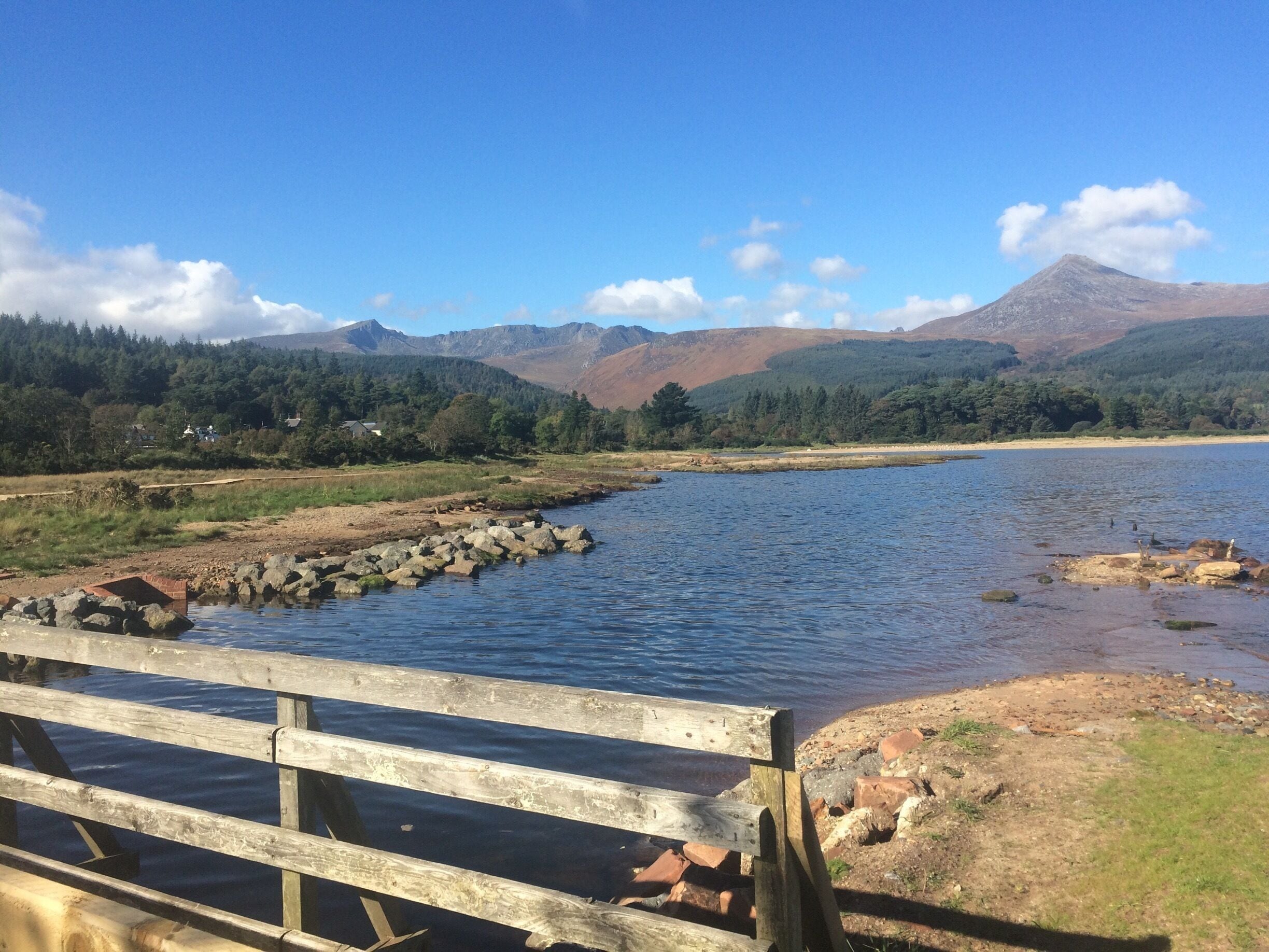 Only a short Ferry from The west coast of  Scotland and you are on the very peaceful isle of Arran! 
Mountains to climb, Water to paddle, swim or sail on. Hotels to relax in and see stunning sunsets. I great weekend getaway! (Don't forget to try their famous cheese and ice cream!!)  