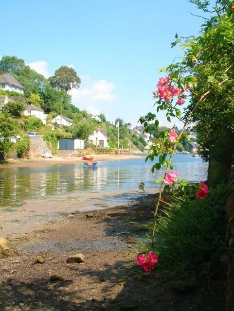 A summer morning in Helford Whitewashed cottages slope gently down to the Helford River on a summer morning in May 2005.