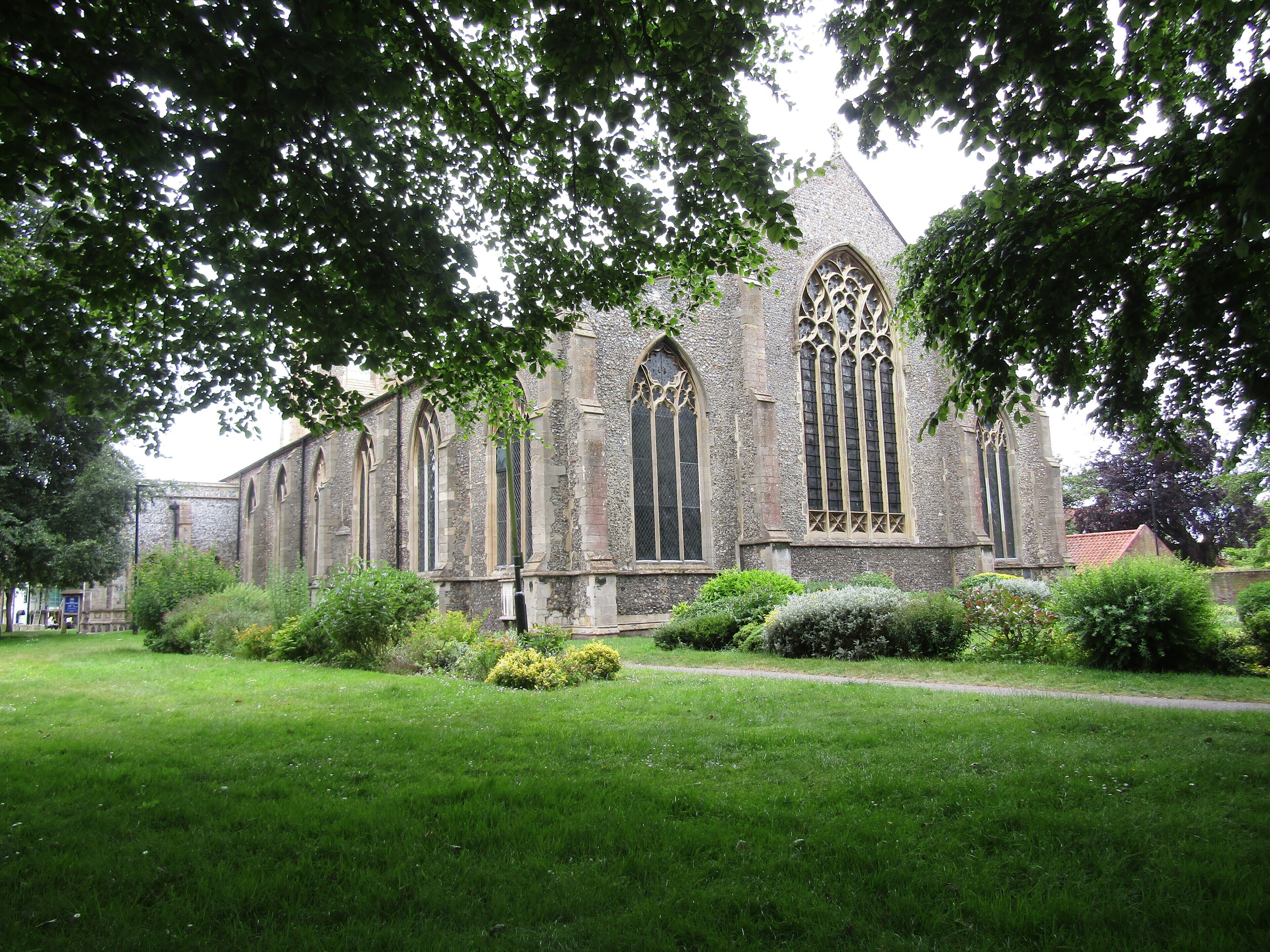 The east facing elevation of the parish church of Saint Nicholas within the town of North Walsham, Norfolk, United Kingdom.
