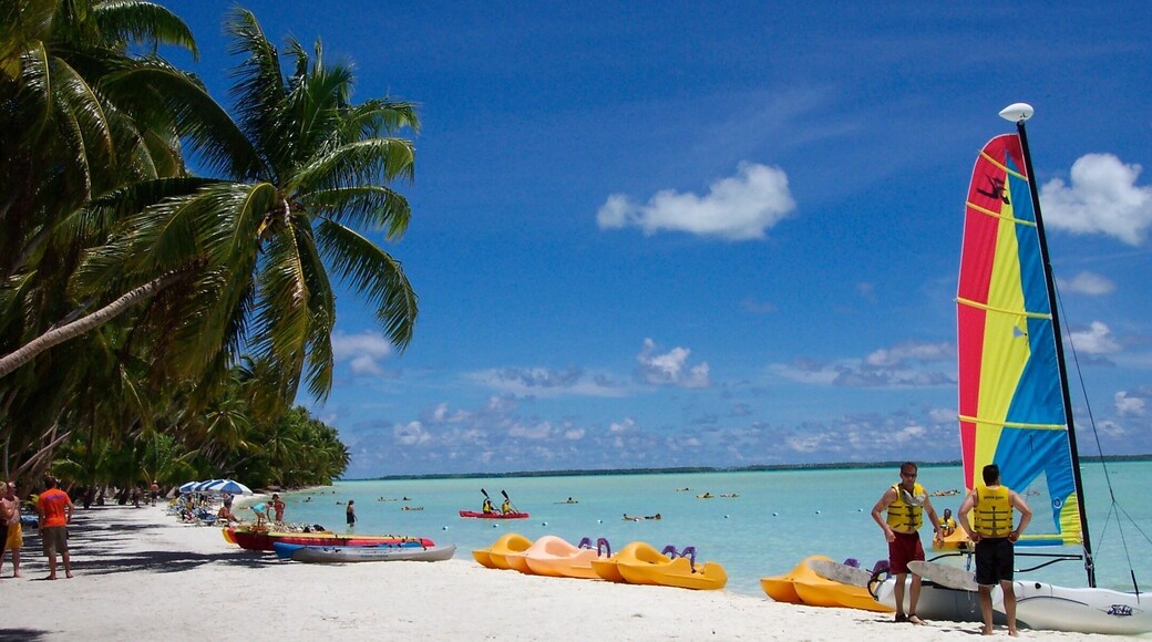 Tabuaeran Kiribati aka Fanning Island. An atoll in the South Pacific. Waist deep crystal clear water in which you can walk miles out. Population of 2,000, the locals are friendly and make incredible handmade souvenirs.