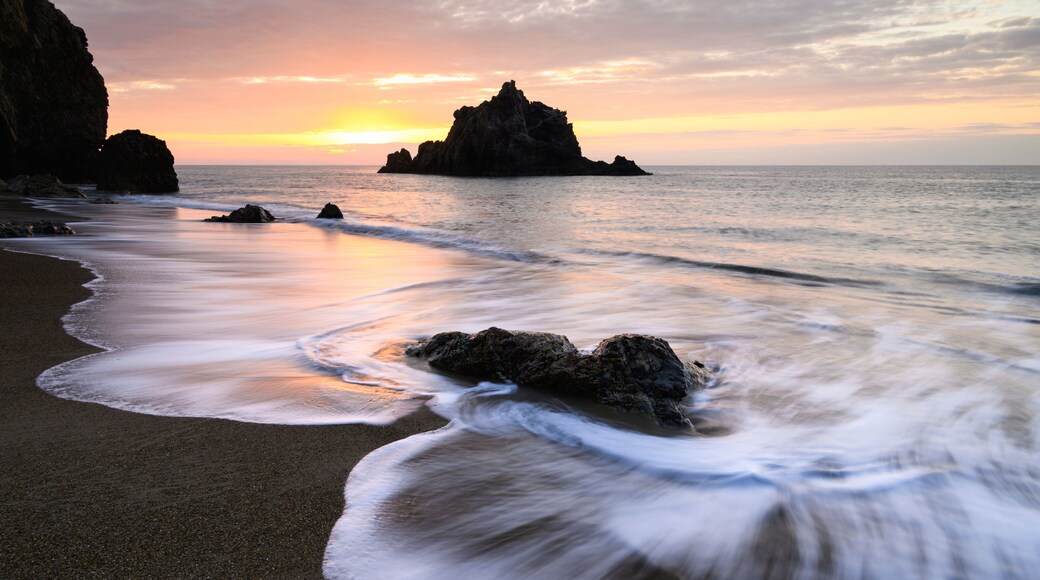 Sunset light waves and sea stack at the beach, Aichi, Japan
