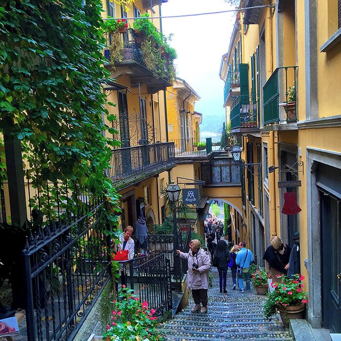 Narrow streets of Bellagio at lake Como, Italy.
Read more on: http://www.travelwithallsenses.com/slow-boat-lake-como/