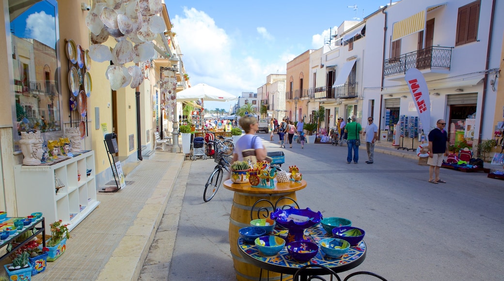 San Vito Lo Capo which includes street scenes and markets as well as a small group of people